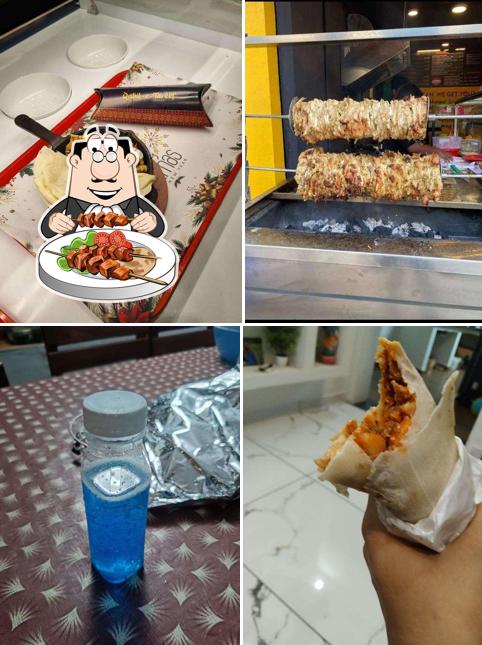 Check out the picture showing food and interior at Vox Shawarma Palakkad