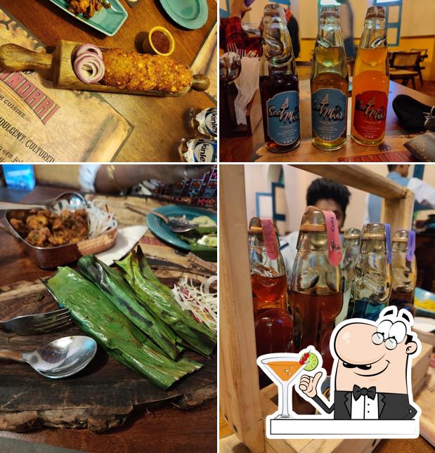 Check out the picture showing drink and food at Zamindari Restaurant