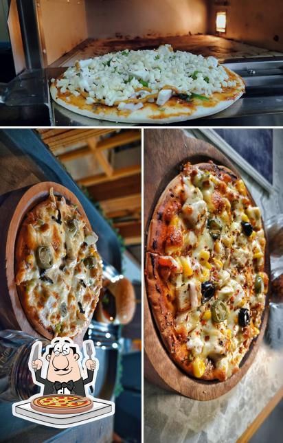 Try out pizza at Backyard Cafe