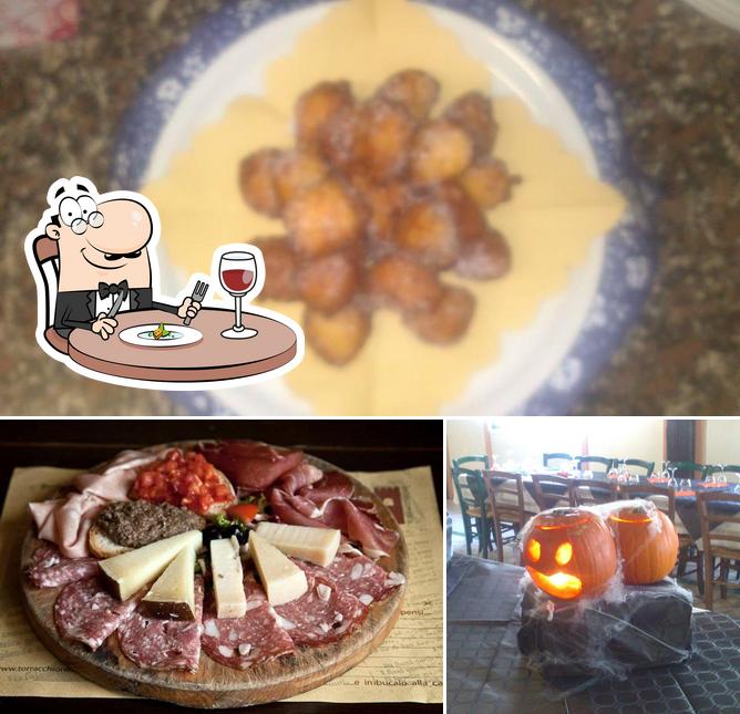 Guarda la immagine che mostra la cibo e interni di La Taverna del Lago