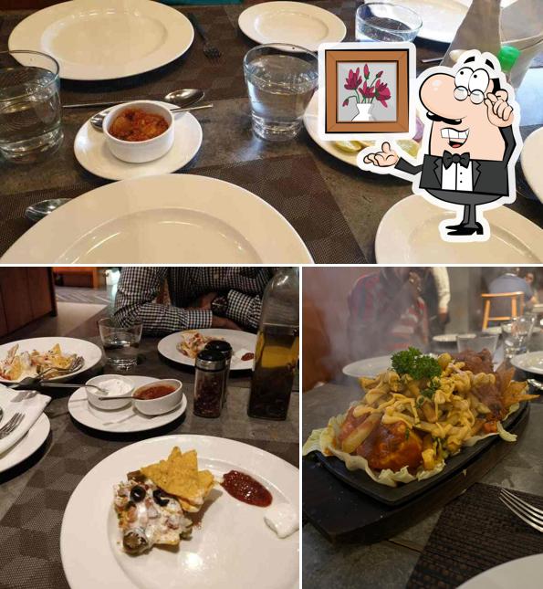 The picture of interior and food at Le Privé