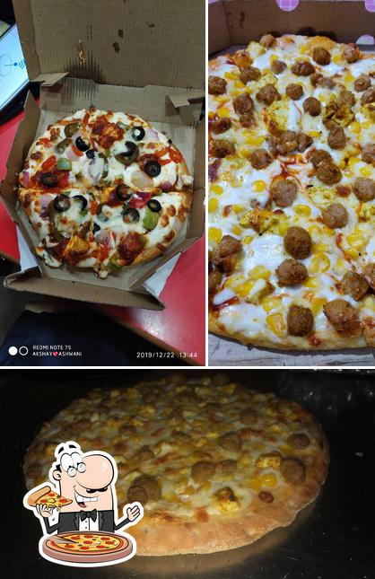 Get pizza at The Pizza Theatre