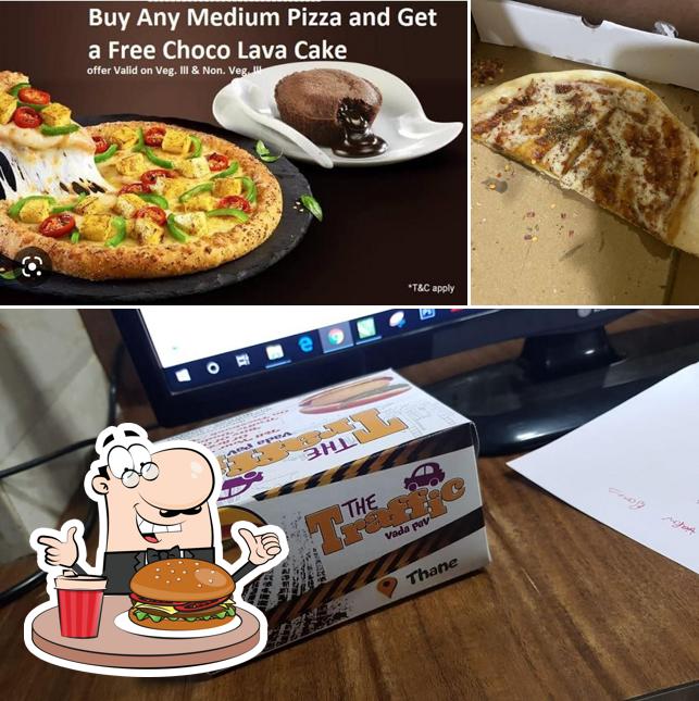 Get a burger at The Traffic Vadapav & Pizza's