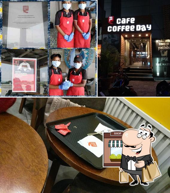 Check out the photo depicting exterior and interior at Café Coffee Day