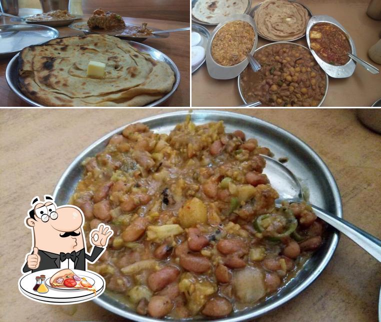 Try out pizza at National Restaurant