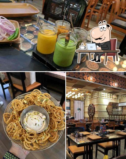 Take a seat at one of the tables at Pot Pot Restaurant