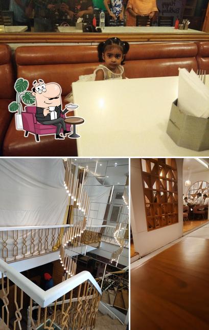 Take a seat at one of the tables at Uncle Sam's Pizzas