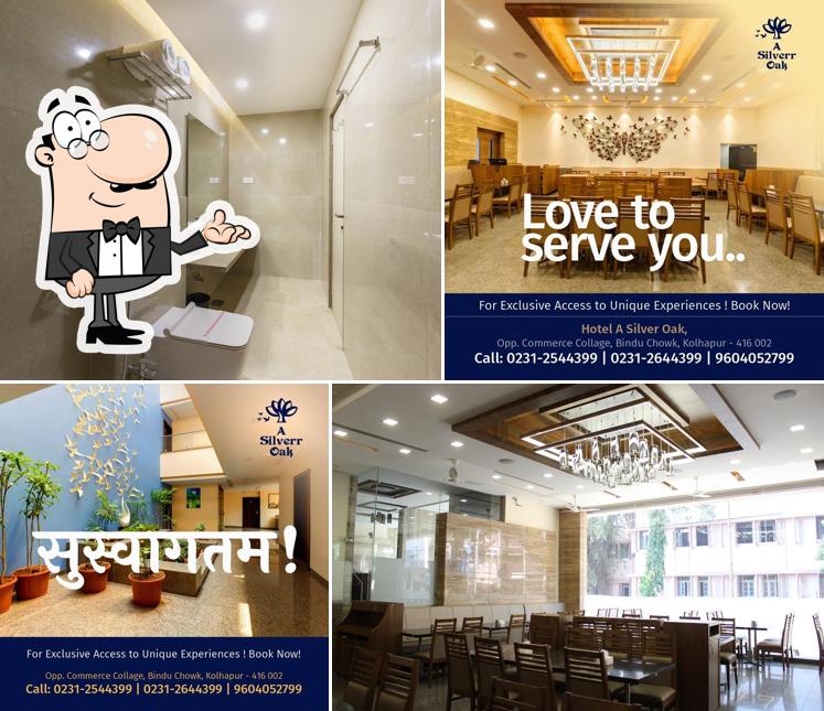 Take a seat at one of the tables at Hotel Silver Oak ( 5 Minutes Walk From Mahalaxmi Temple )