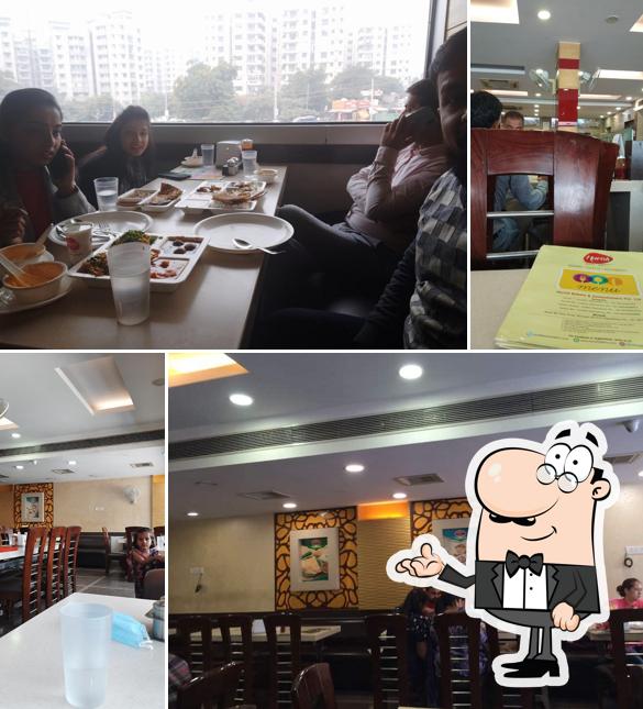 Take a seat at one of the tables at Harish Bakery