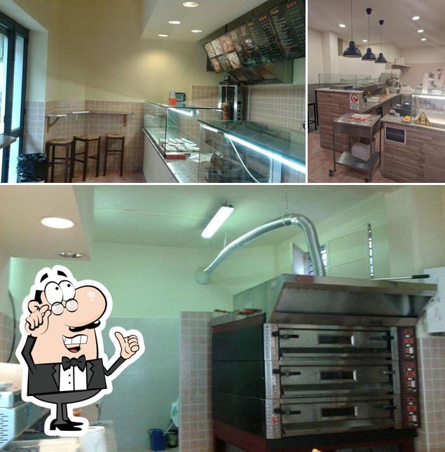 Dai un'occhiata agli interni di Pizza & Pizza
