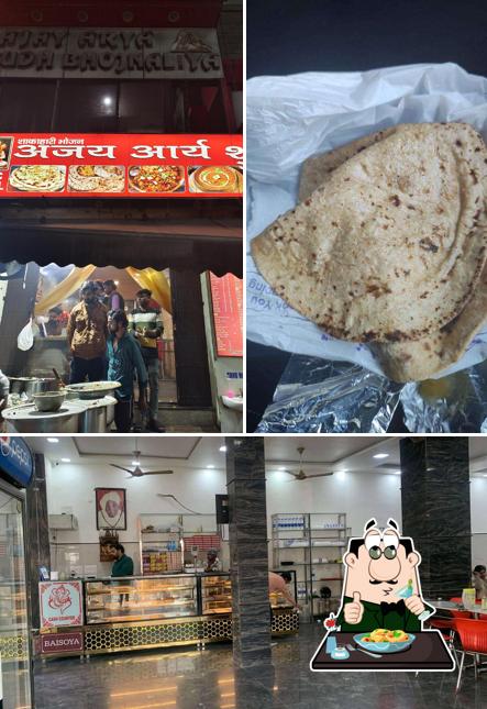 This is the image depicting food and interior at Ajay Arya sweets & restaurant