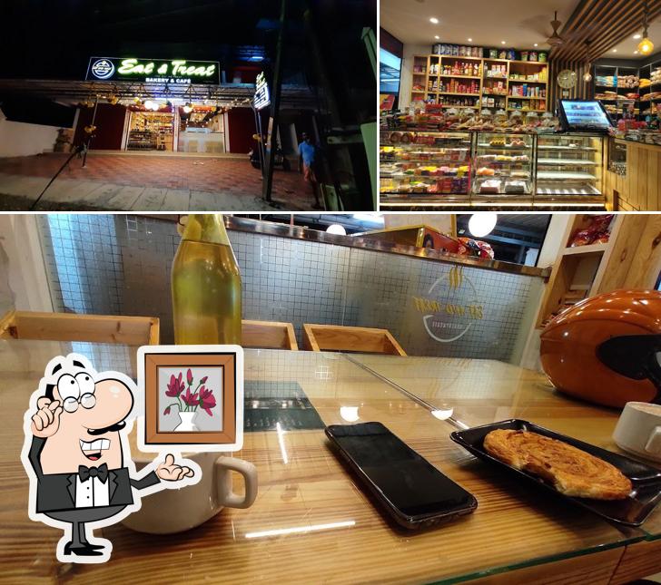 This is the picture depicting interior and food at Eat and treat Bakery and cafe