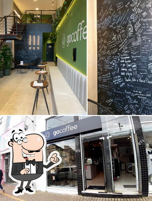 A ilustração do Go Coffee - Joaquim Nabuco’s exterior e quadro-negro
