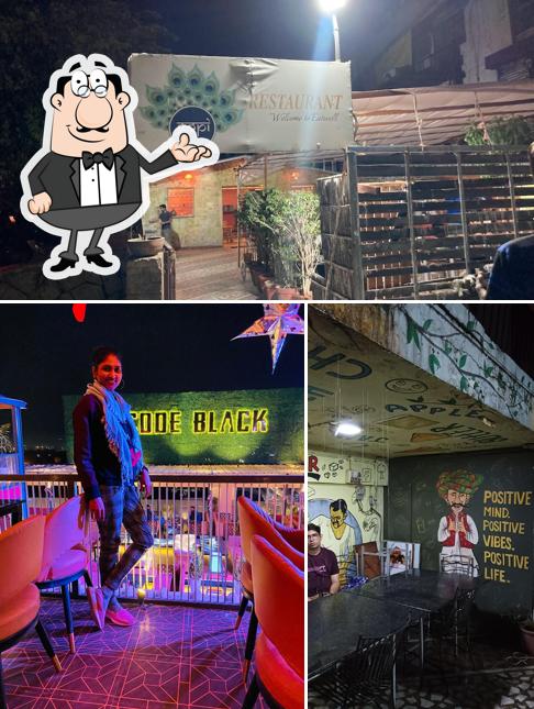 Take a seat at one of the tables at Gopi Restaurant