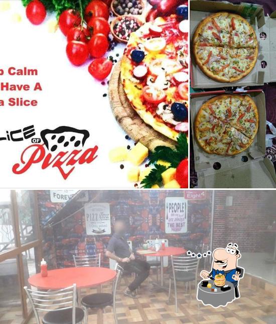 This is the image displaying food and interior at Slice Of Pizza