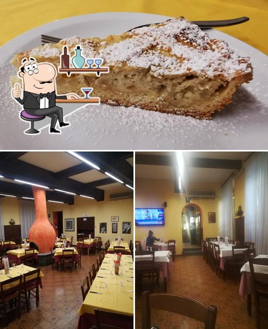 Dai un’occhiata alla foto che raffigura la interni e torta di Al Faro