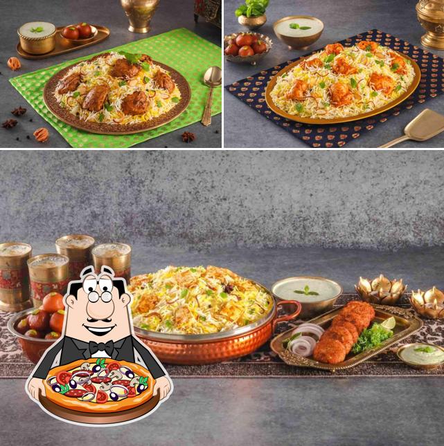 Get pizza at Behrouz Biryani Sanjay Place