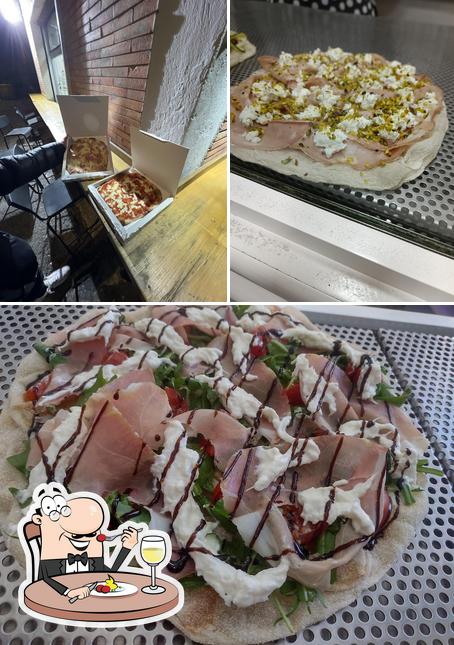 Questa è la immagine che presenta la cibo e interni di La Croccante Pinseria Romana
