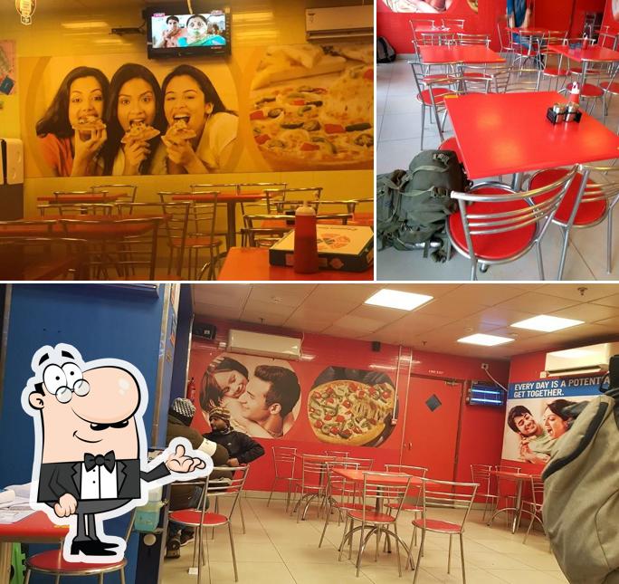 Check out how Domino's Pizza Vikas Cine Mall, Dehradun looks inside