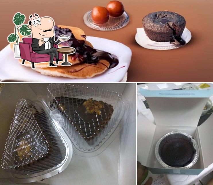 Take a look at the image displaying interior and food at Sweet Truth Vasant Nagar