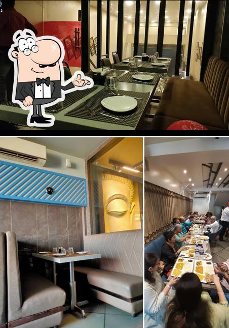 Take a seat at one of the tables at Hardasmal Restaurant
