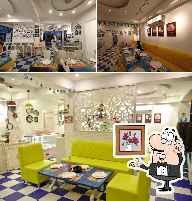 Check out how Happy Belly's Mehfil Restaurant ---A pure Vegetarian Restaurant looks inside