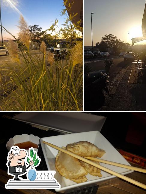 Questa è la foto che mostra la esterno e cibo di Pad Thai