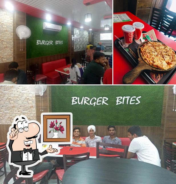 The restaurant's interior and pizza