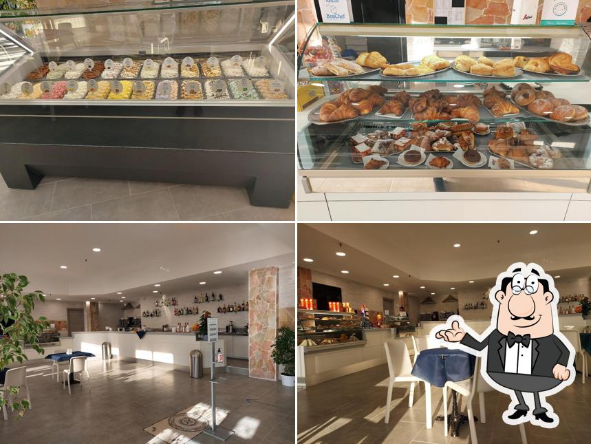 Guarda la immagine che mostra la interni e cibo di VIVITA CAFE