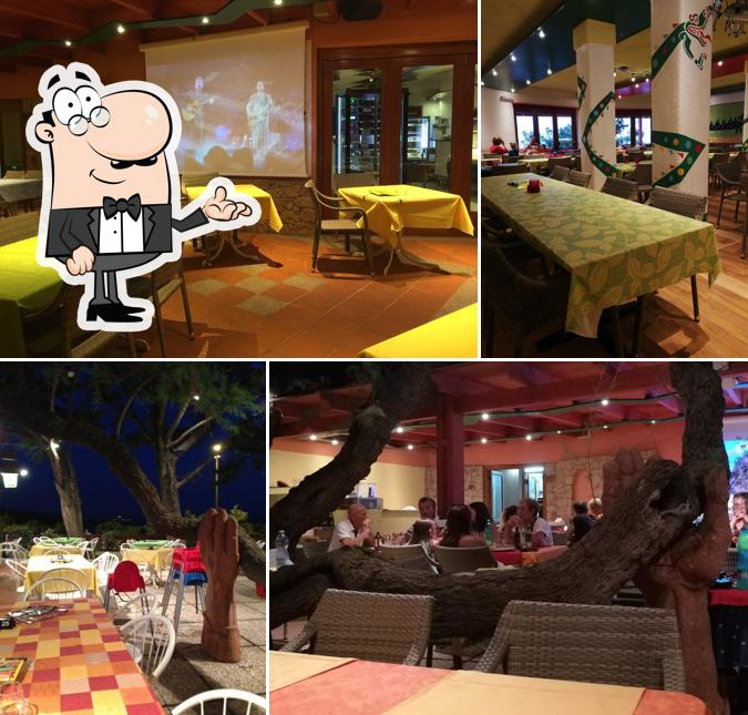 Dai un'occhiata agli interni di Coccodrillus Pizza Restaurant