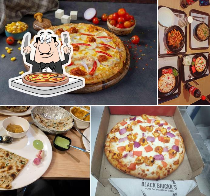 Get pizza at FLAMES Restaurant
