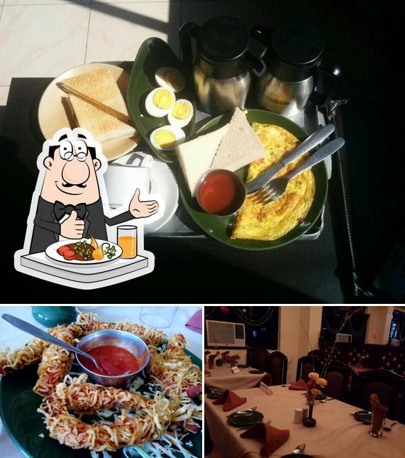 This is the photo depicting food and interior at Hotel Menino