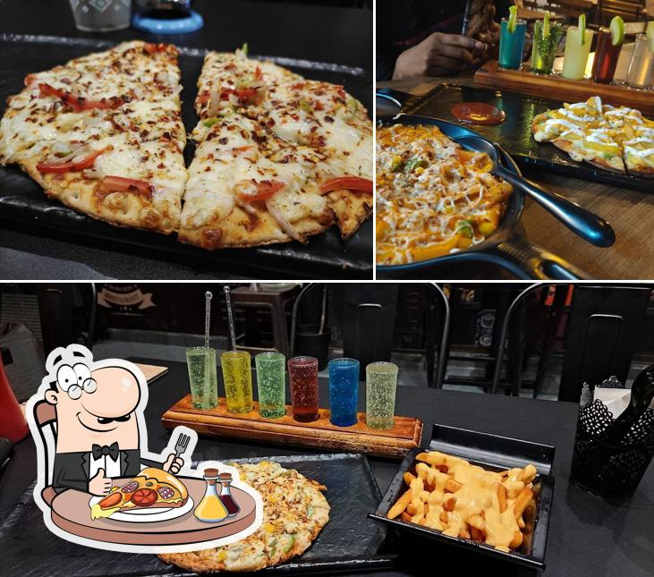 Try out pizza at The Nosh Bistro Kukatpally