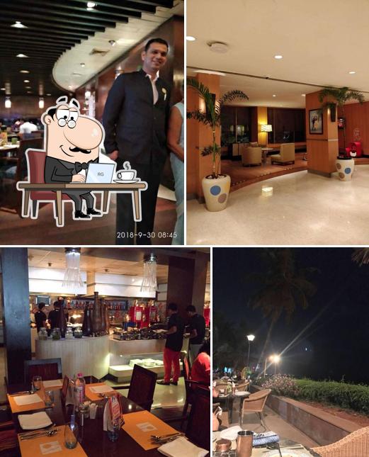 Take a seat at one of the tables at The Square - Novotel Mumbai Juhu Beach