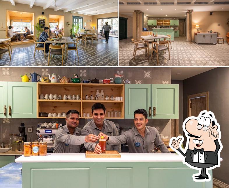 Take a seat at one of the tables at Under The Neem