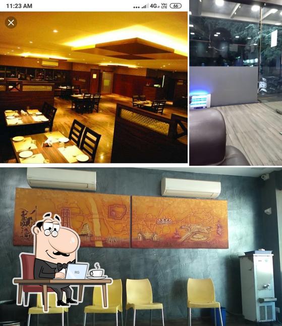 Take a seat at one of the tables at The Vellore Kitchen Take Away