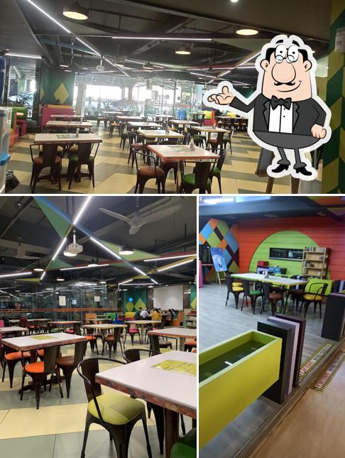 Take a seat at one of the tables at Food Court Restaurant