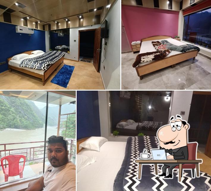 Take a seat at one of the tables at Meenakshi Restaurant