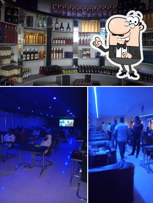 The photo of interior and wine at Mullai Bar