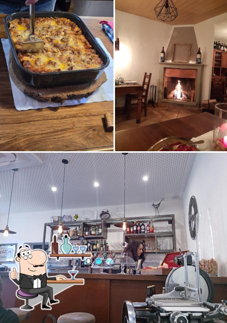 Questa è la immagine che mostra la interni e cibo di Osteria Rustico