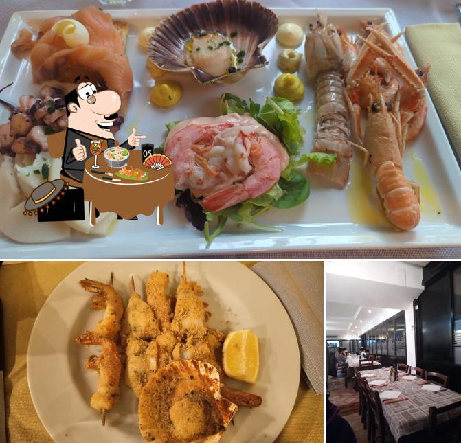 Trattoria Don Abbondio si caratterizza per la cibo e tavolo da pranzo