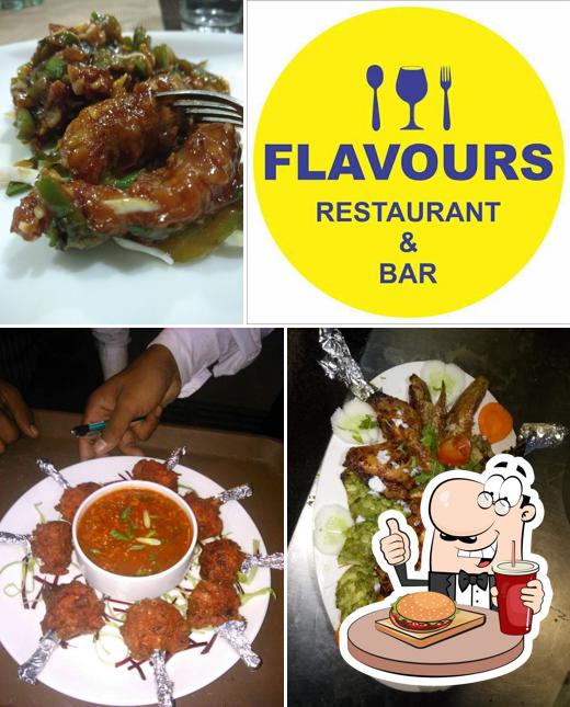 Get a burger at Flavours Restaurant Live Orchestra Bar