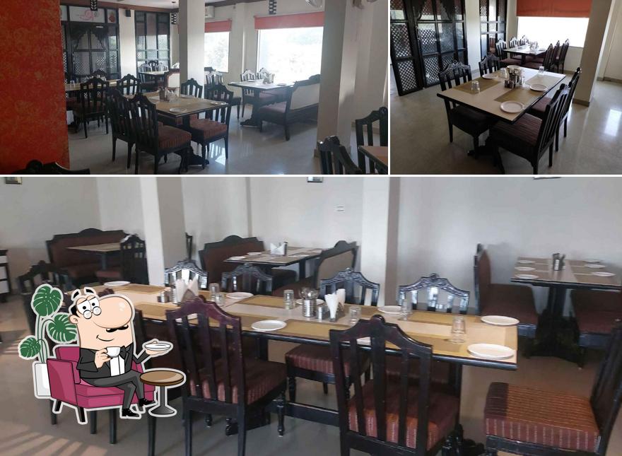 Check out how Rasoi Restaurant - Hotel Relax Inn looks inside