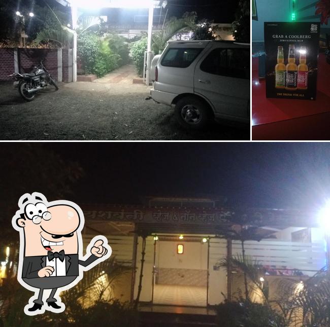 The picture of exterior and beer at Hotel Yashwanti & Family Garden Restaurant