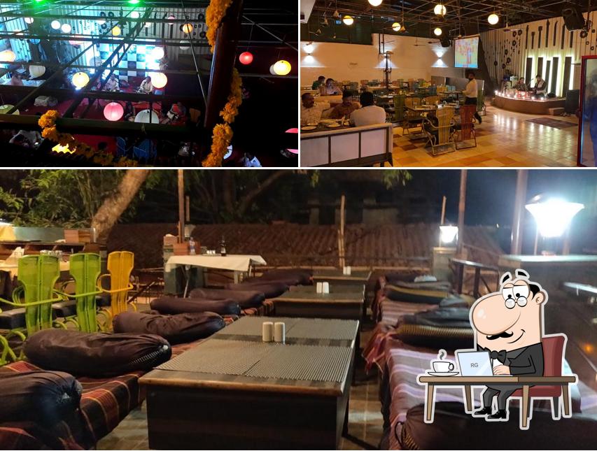 Take a seat at one of the tables at SHERA 2.0 Restaurant & Bar/ Varanda Banquets