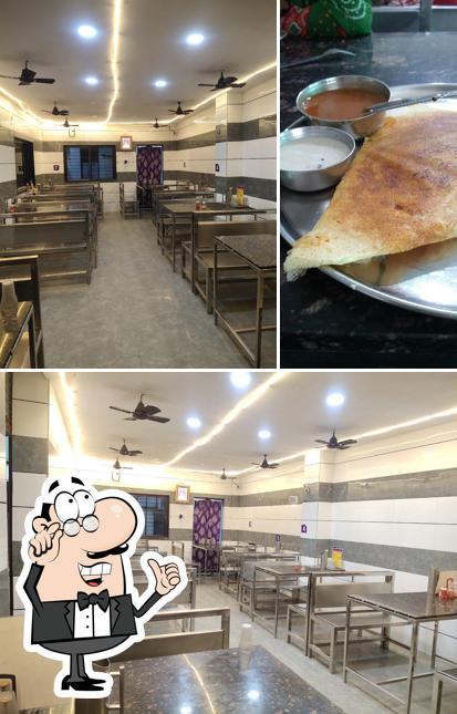 Check out the photo showing interior and food at LAKSHMI IDLI VADA CORNER