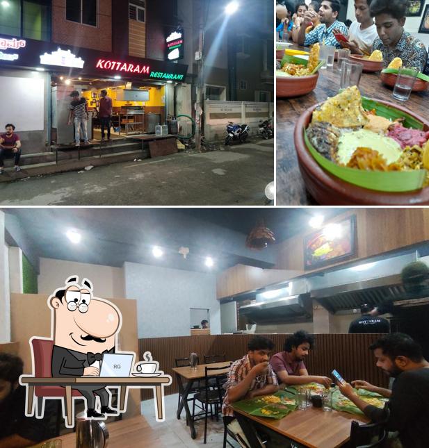 Take a seat at one of the tables at Kottaram restaurant Bangalore