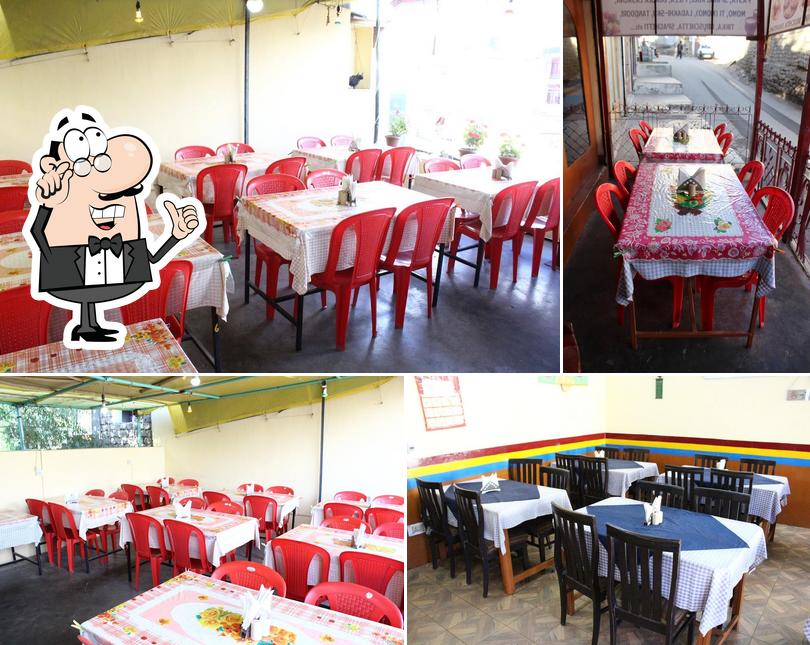 The interior of Happy World Restaurant - Best Restaurants in Leh Ladakh