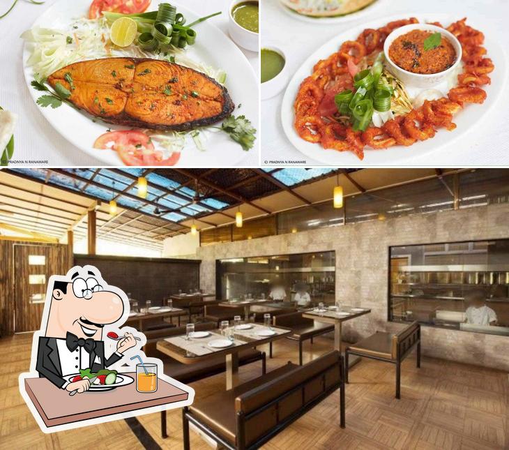 Costal Tadka is distinguished by food and dining table