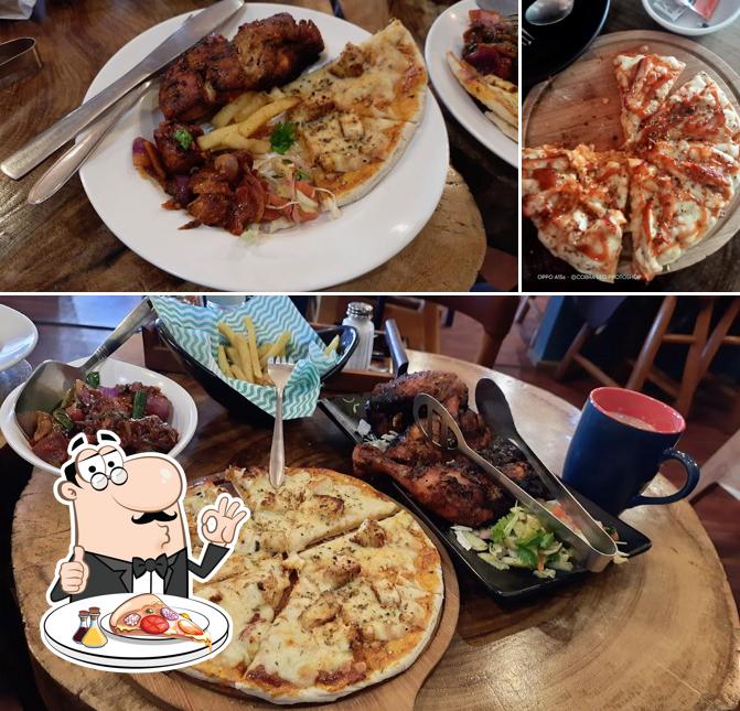 Get pizza at Kip's Smoke House